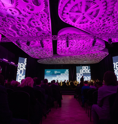 An auditorium with a backlit ceiling 