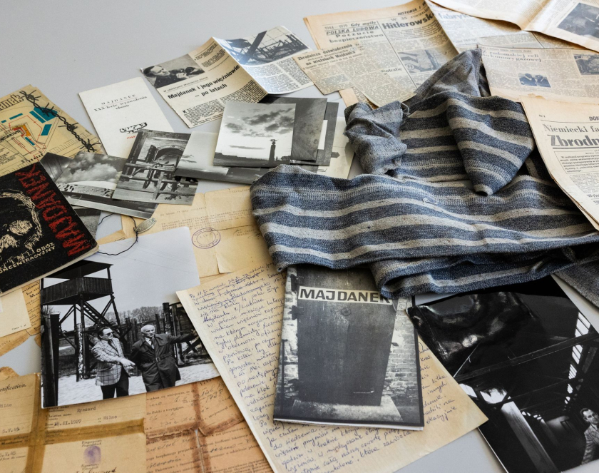 A collection of items: photographs, handwritten letters, documents, newspaper articles, and a piece of fabric.
