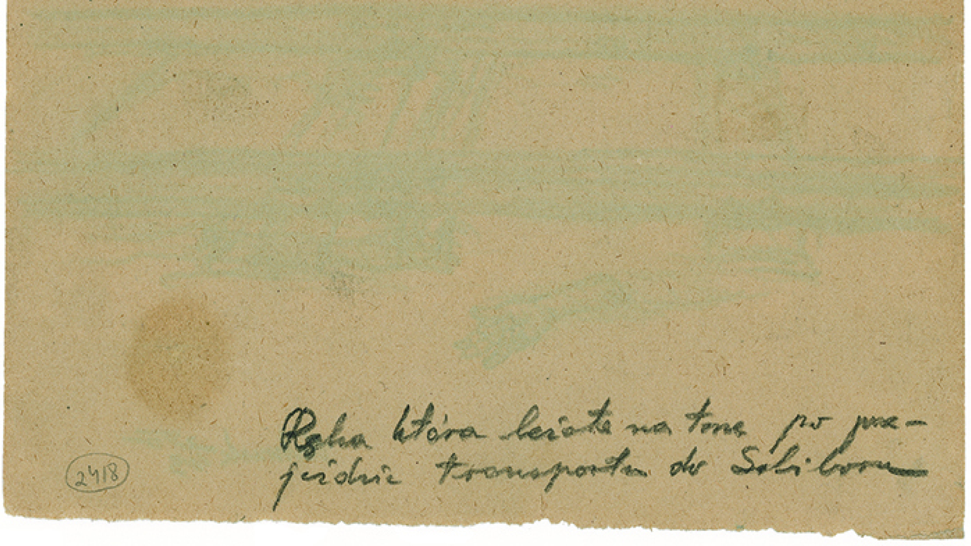 Kawałek kartki, z prawej strony na dole ręczny napis: Ręka która leżała na torze po przejeździe transportu do Sobiboru