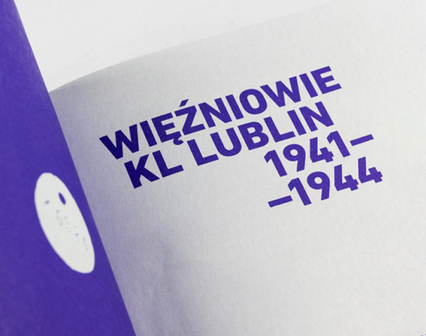Otwarta książka, fioletowa strona oraz napis: Więźniowie KL Lublin 1941-1944