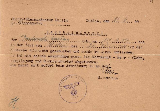 Dokument w języku niemieckim pisany na maszynie, na dole pieczęć z orłem