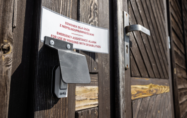 Przycisk z napisem: Dzwonek dla osób z niepełnosprawnościami 